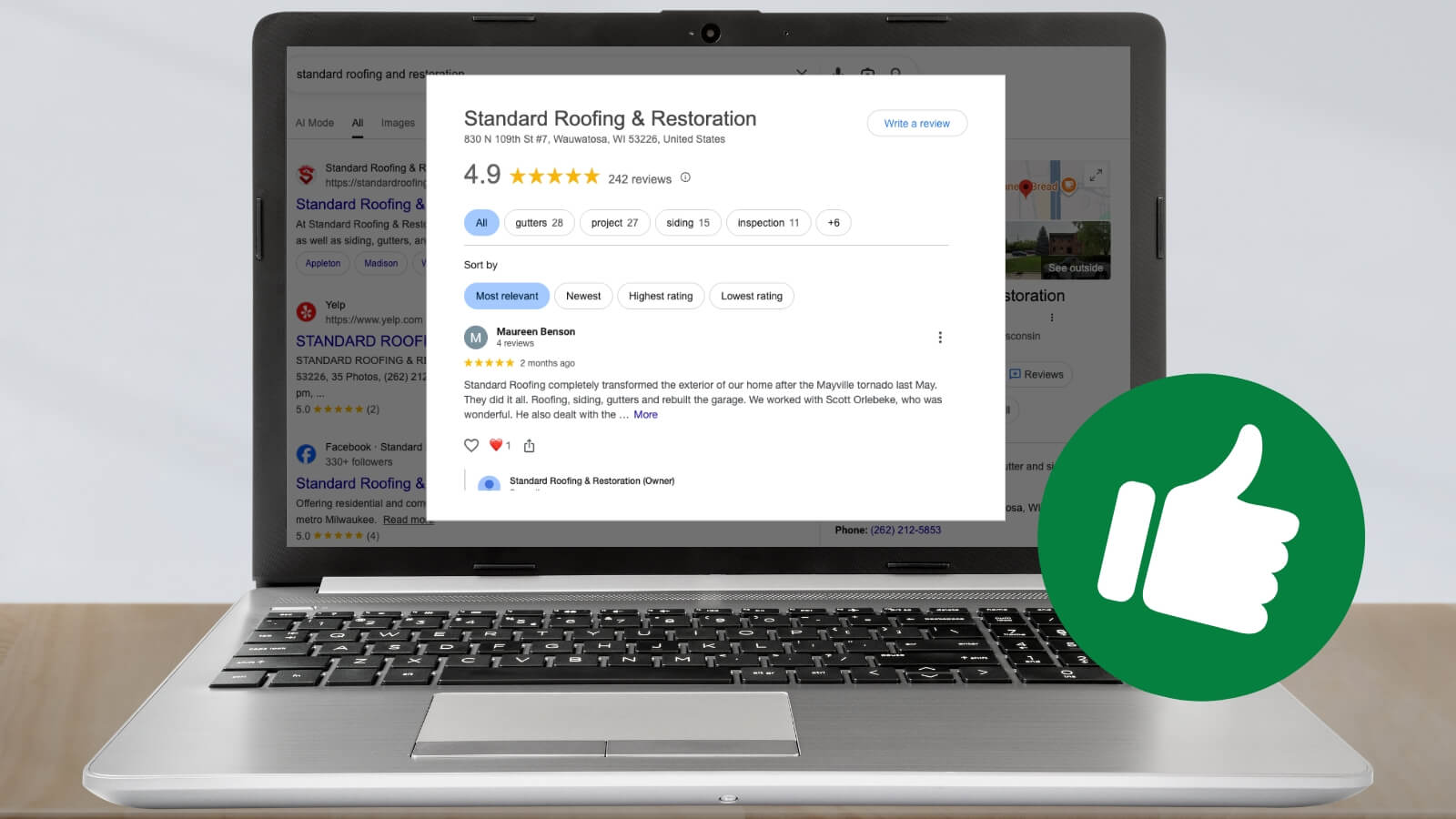 standard roofing and restoration google review on laptop screen