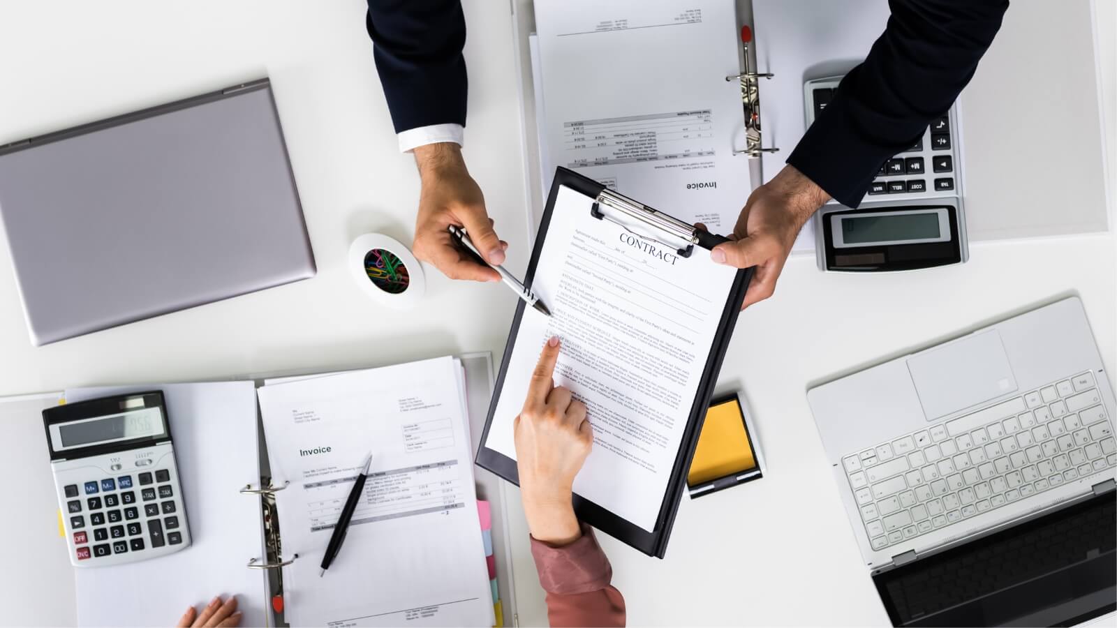 People looking at documents