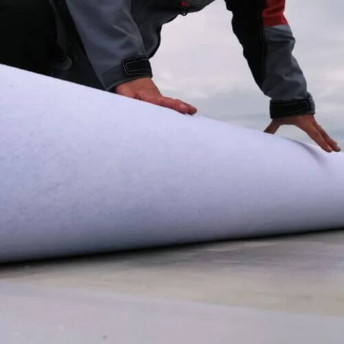 self adhesive roofing being rolled out self adhesive roofing being rolled out