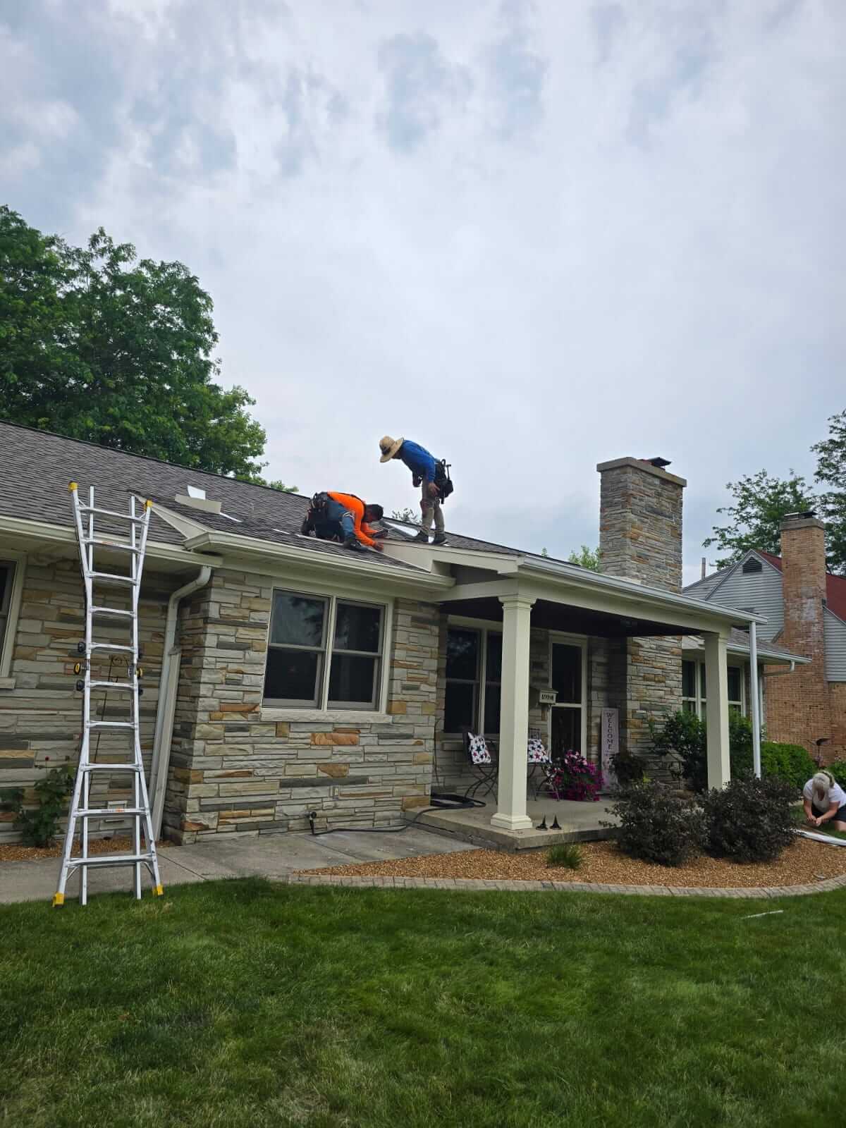 person working on roof
