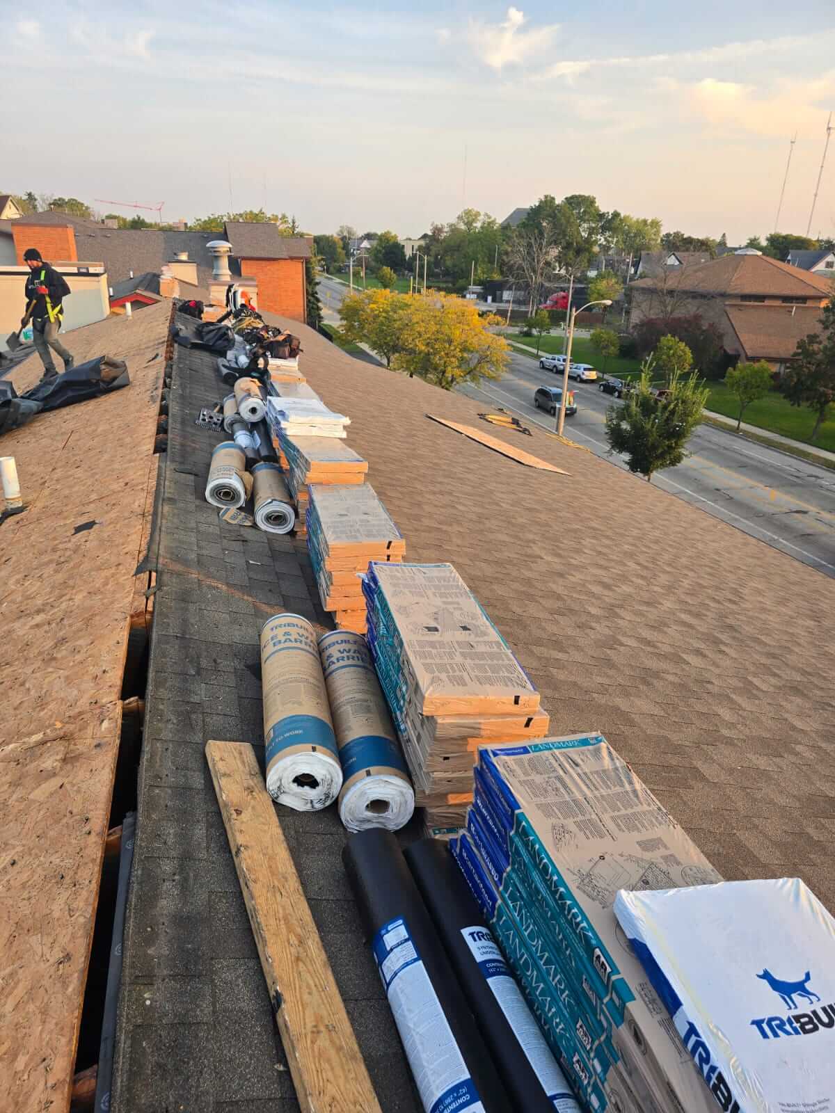 construction materials on top of a brown roof