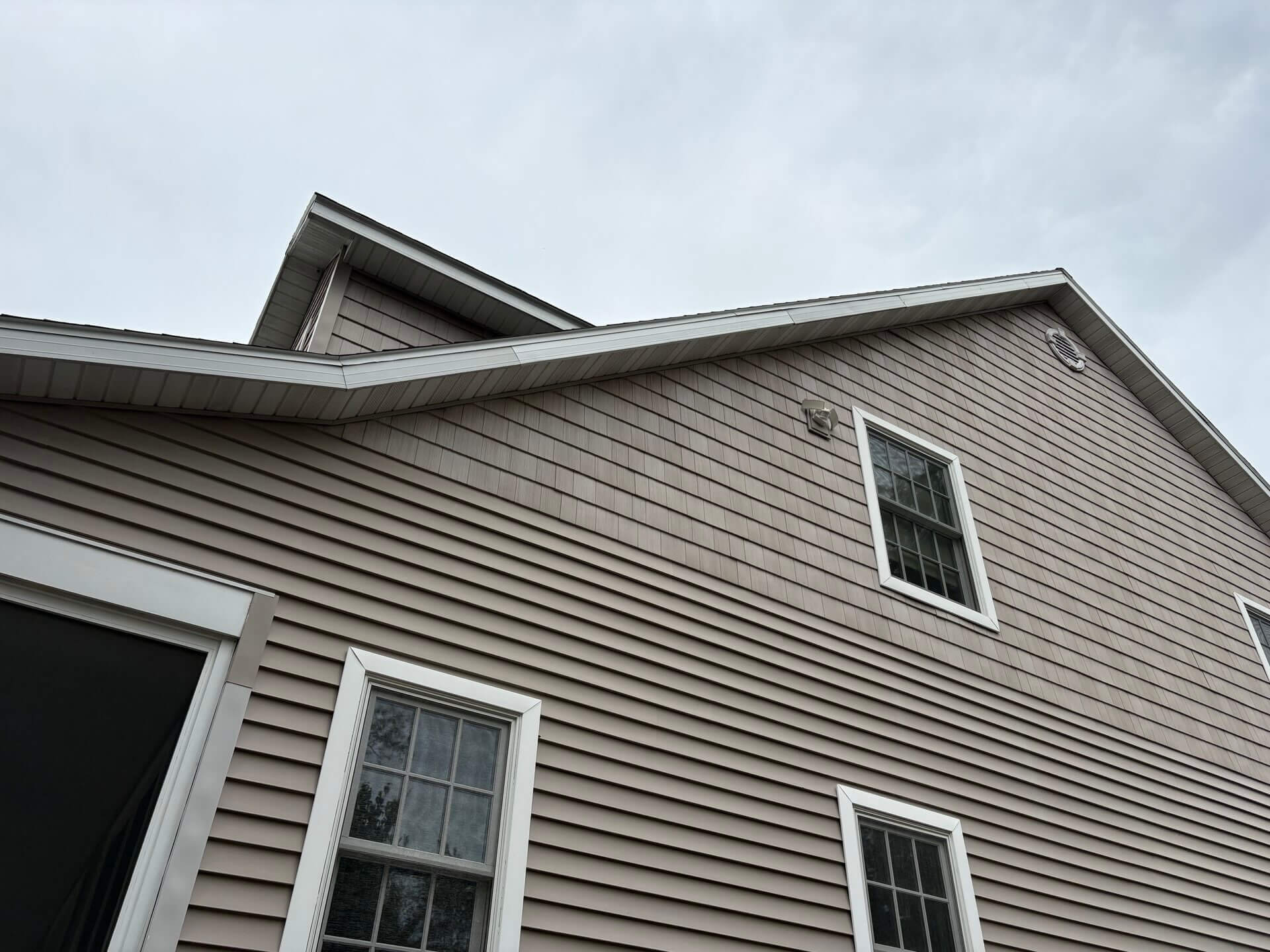 up close siding on a brown house